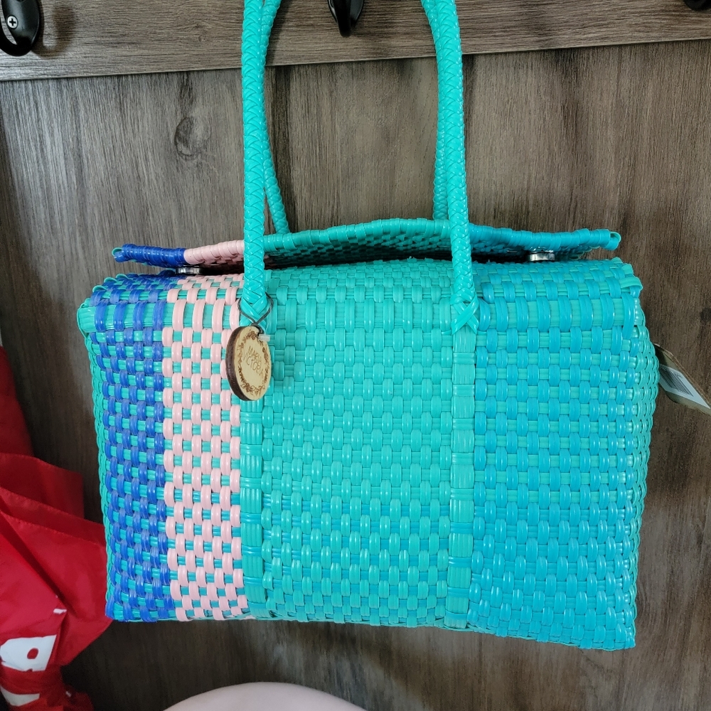 Maria Victoria Siquerios woven plastic basket tote. Bora Bora